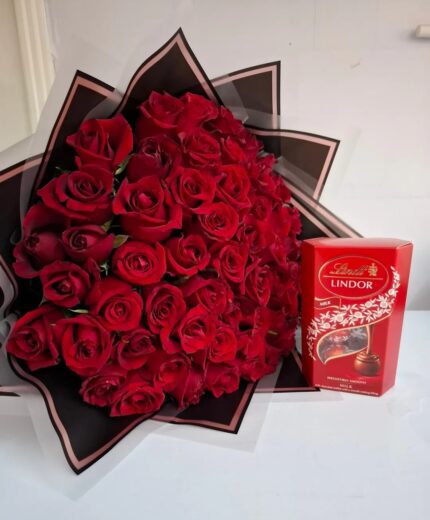 Red roses with lindor